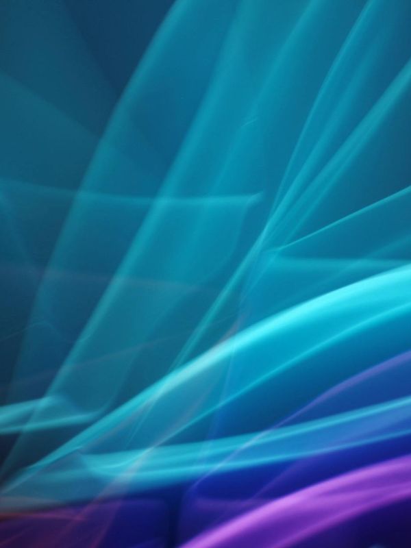 Cyan neon flow waves representing energy and vitality flow